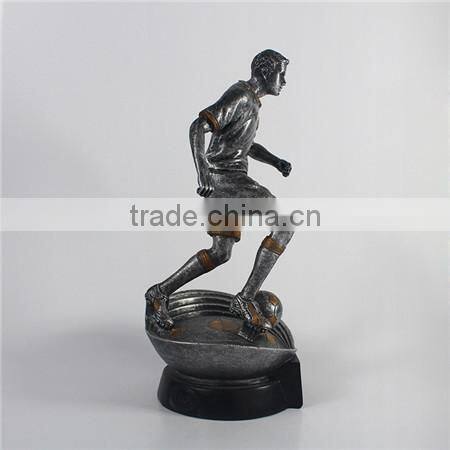 Resin soccer player trophy