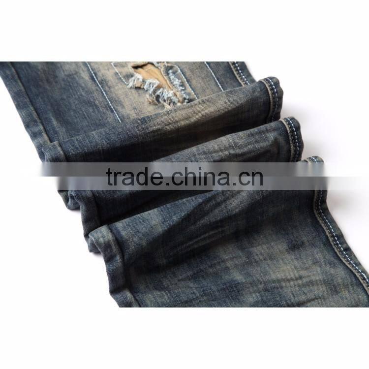 Top sale New design Autumn customized blue hole design denim ripped jeans men 2017 denim