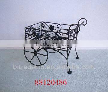 Antique white metal butterfly plant holder