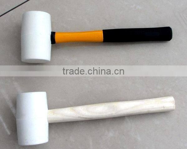 white colored rubber mallet hammer with wooden handle