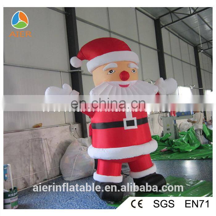 Outdoor inflatable Christmas moving Santa for sale