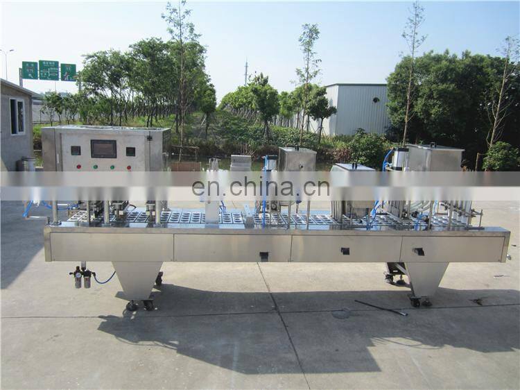 Automatic plastic cup sealing lid machine