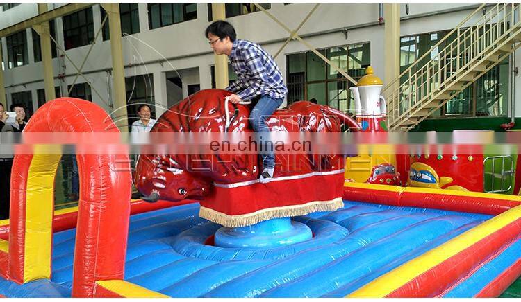 Cheap amusement park rides game bull fighting inflatable mechanical rodeo bull riding machine for sale