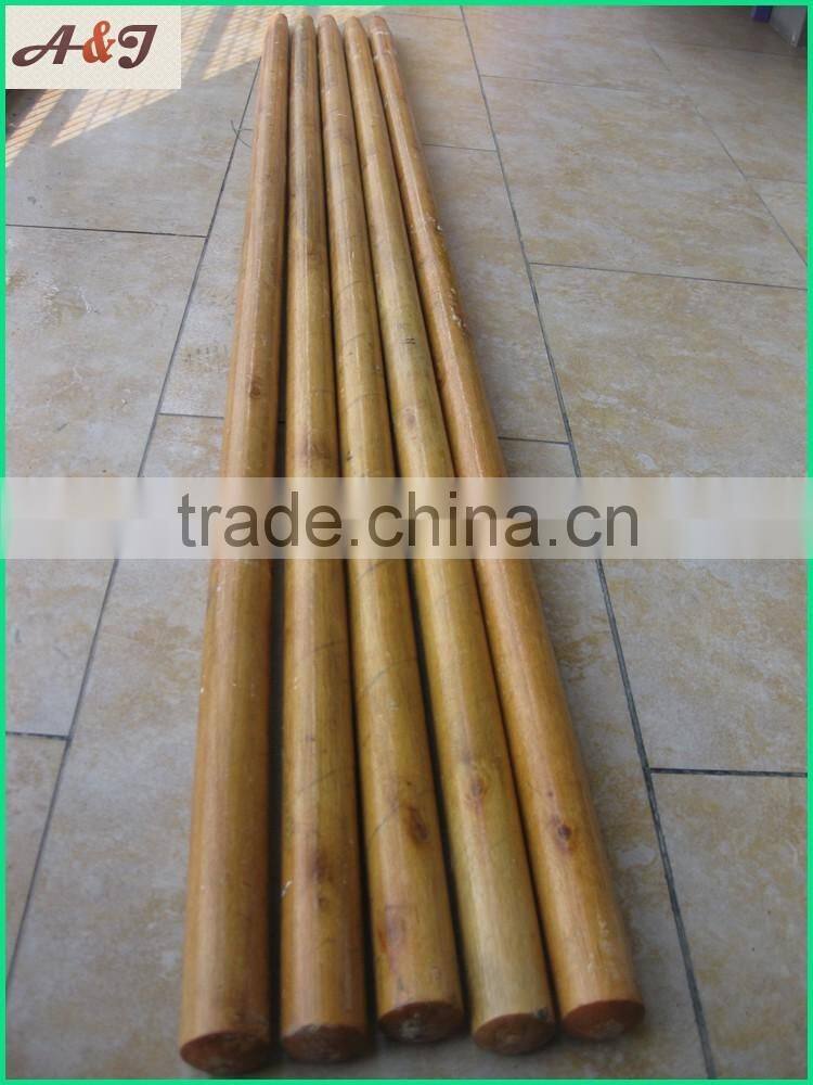 varnished wooden spade handle