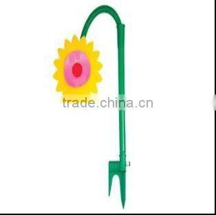 The Garden good helper smiling sunflower sprinkler