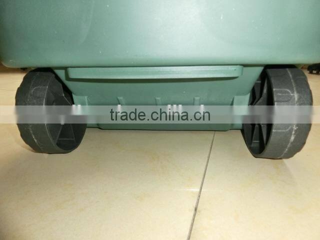 plastic trolley bin in garden , garden tool trolley