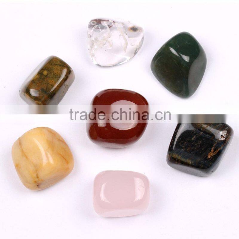 Different crystal tumble stones for healing, meditation and decoration
