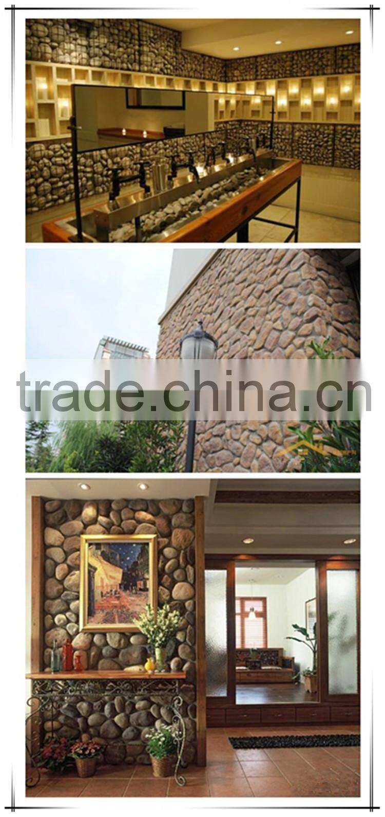 Faux cobble stone wall cladding landscape design