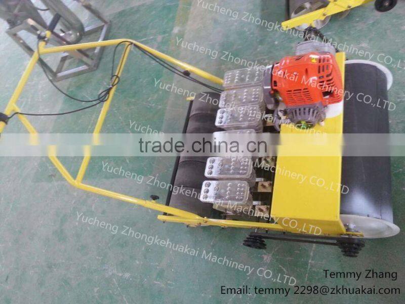 2015 The latest hand push vegetable sowing machine