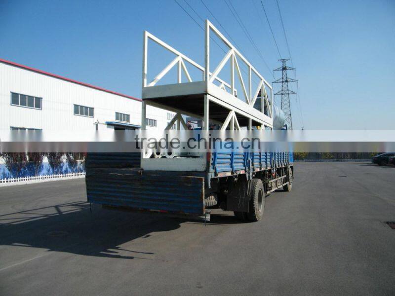 Sludge treatment bridge type sludge scraper