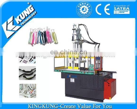 2014 TC-700-2S 77 tons vertical double siding injection machine