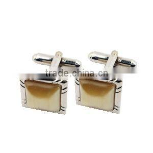 Metal Cufflink with diamonds design