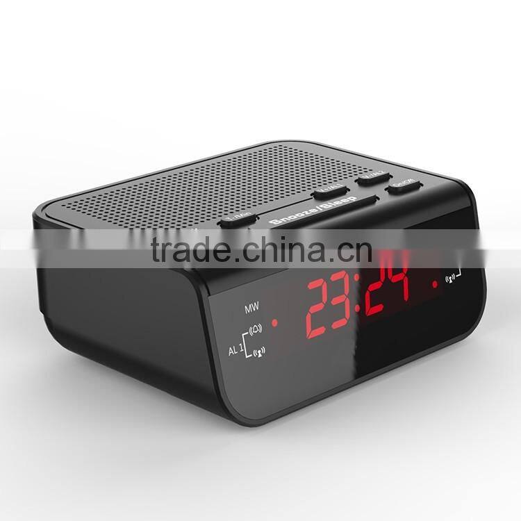 Radio alarm clock with speaker