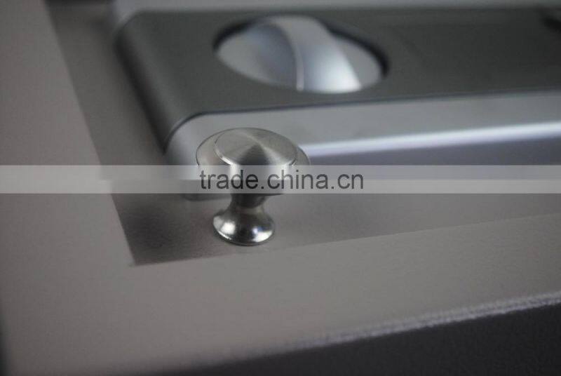 Small open top safe box with a handle into a drawer