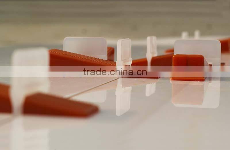 Plastic medium tile leveling system