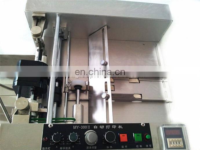 MY-300 automatic batch/lot/series number expiry date embossing printing machine for plastic bags/aluminum foil