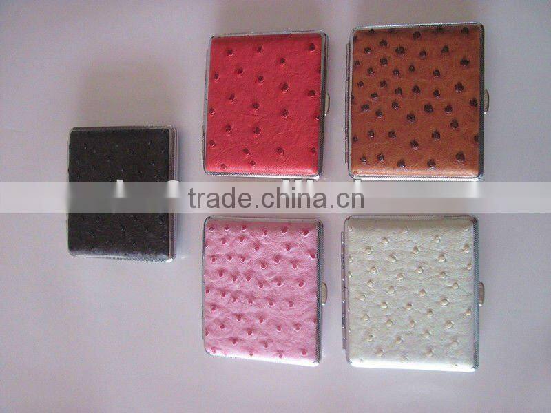 Metal cigarette case. Leather cigarette box.