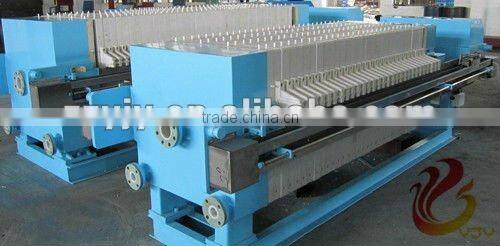 Hydraulic filter press for mine sludge