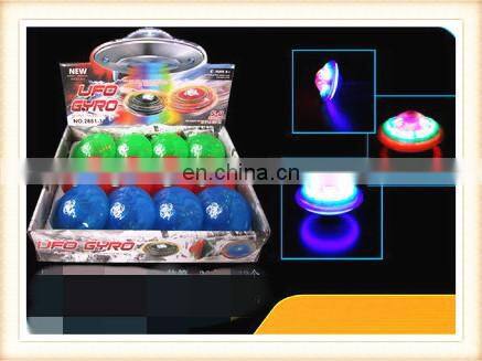 New product Plastic kids Christmas toy infrared ray musical spinning flashing top toy
