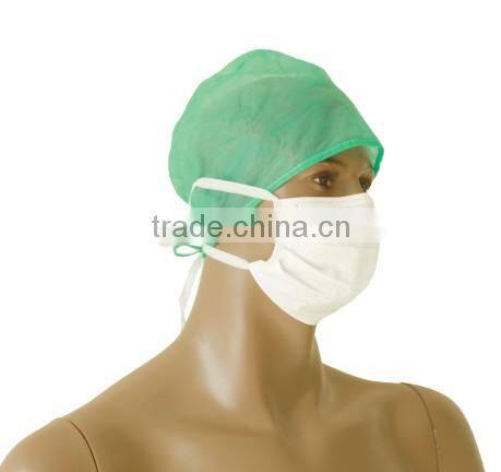 Disposable surgical face mask with shield