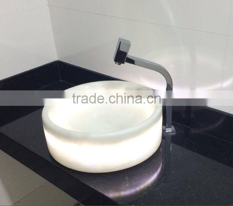 White onyx marble transmitting washroom sink