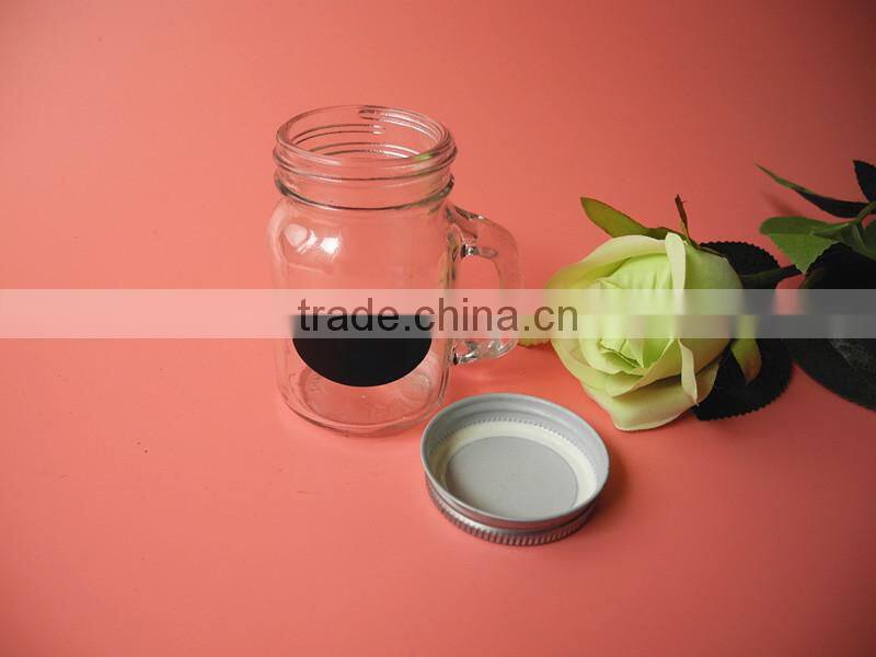 small handling screw cap sealing glass mason jar with blackborad
