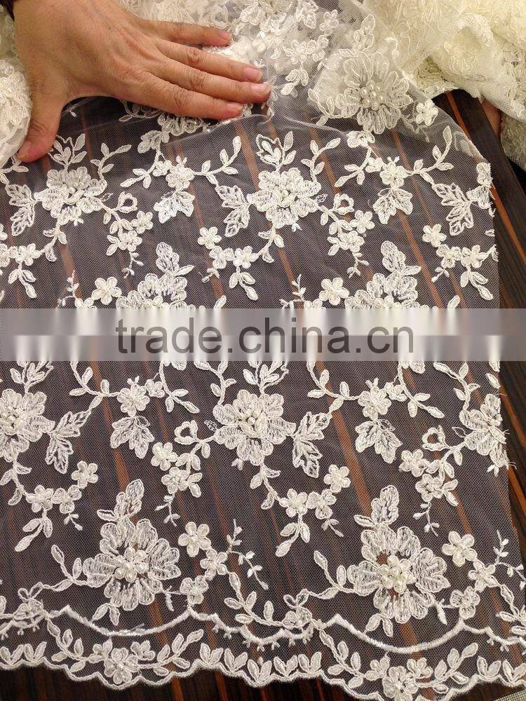 Low price promotional net cord lace fabric