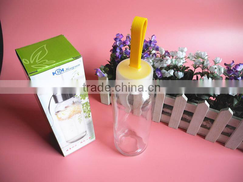 printed glass water bottle with protective sleeves and ribbon