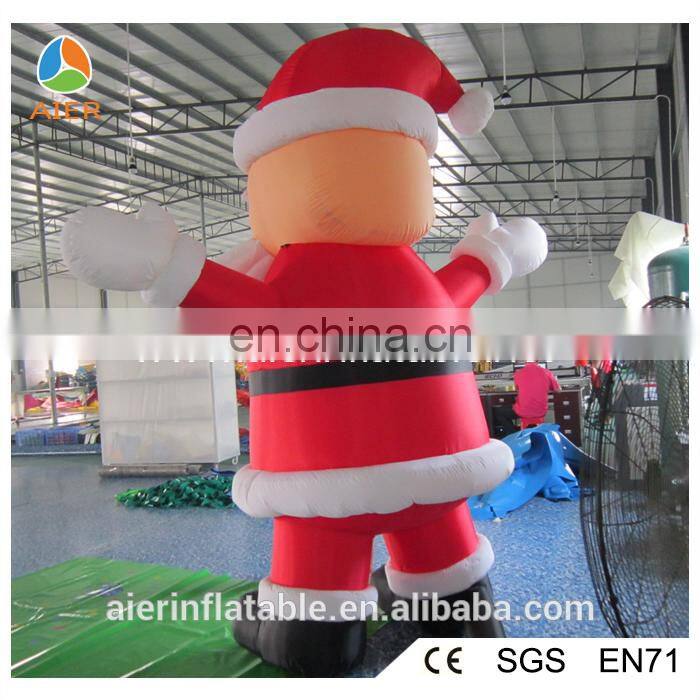 Outdoor inflatable Christmas moving Santa for sale