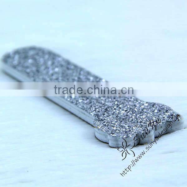 Mini nail files with shimmering powder