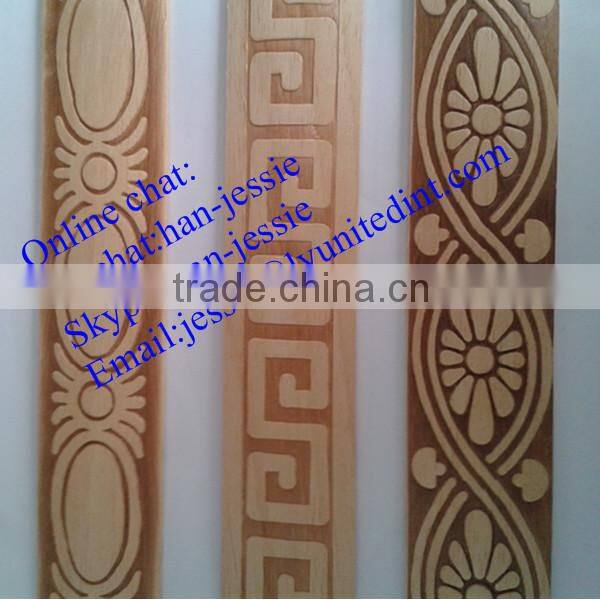 unpainted wood baseboard