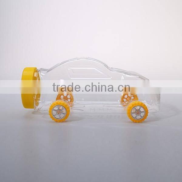 Small cute clear plastic bottles in toy shaped for candy