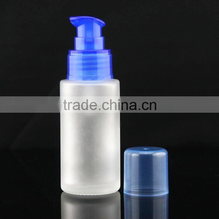 frosted lotion glass bottle with blue press pump