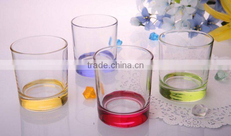 Drinking water glass with spray colors on bottom