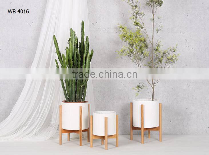 walnut / beech wood stand with smooth matte pot concrete planter pot