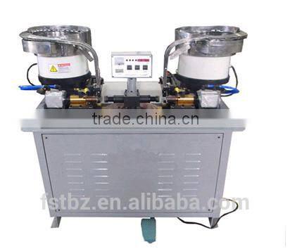 Automatic earlug spot welder for chemcial cans