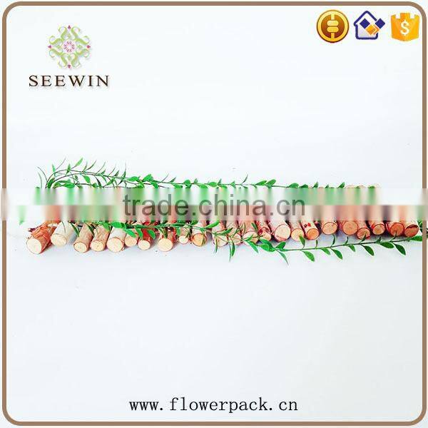 The birch stick is decorated in the garden