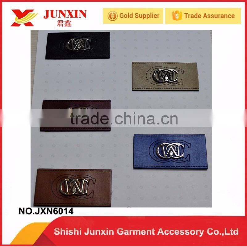 2016 custom debossed leather label for garment with metal logo