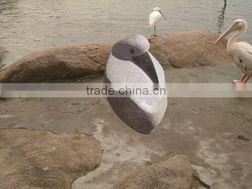 hand carved stone bird sculpture