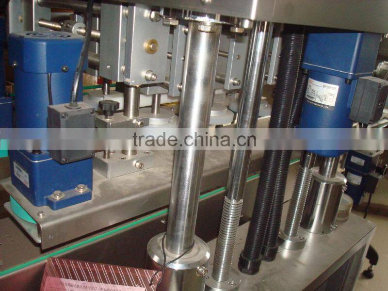 High speed childproofing cap capper