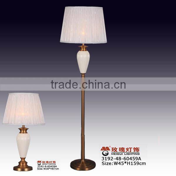 white and black metal floor stand light