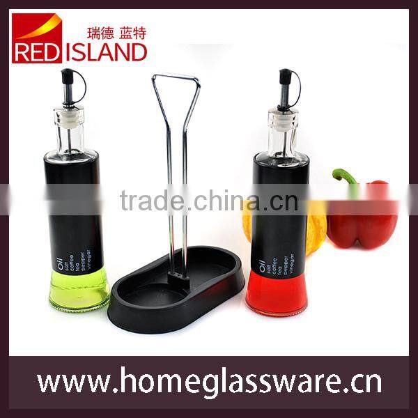 Round olive oil and vinegar bottle with coating and base