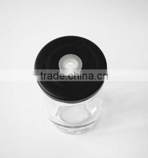 black skull head decorate glass bottle for juice or liquior with metal lid straw