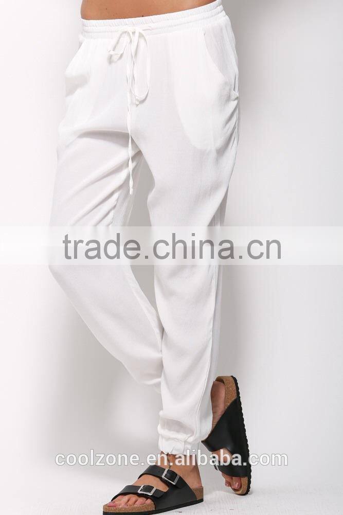 Loose fit elastic tied waist jogger pants with side pockets