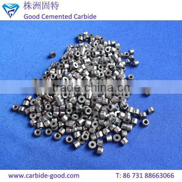 Discharge valve seat made from tungsten carbide