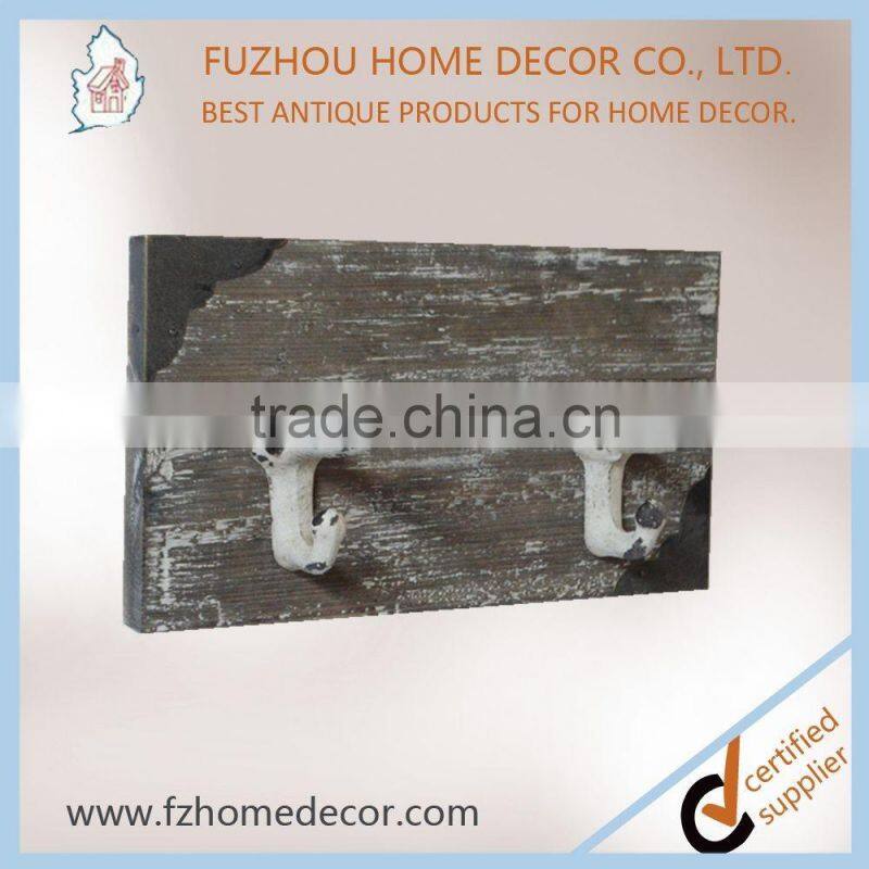 Promotional antique metal hook on wood plank for wall decoration