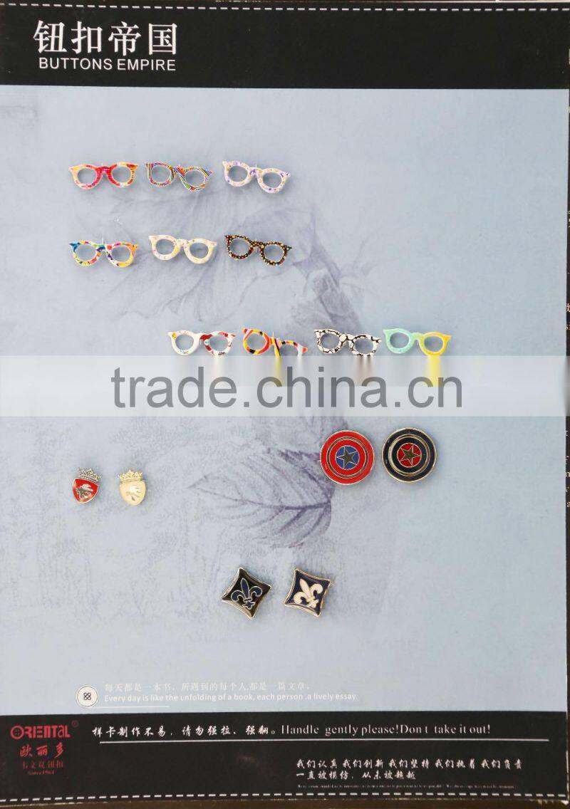 black epoxy with silver base mustache-shaped metal brooch