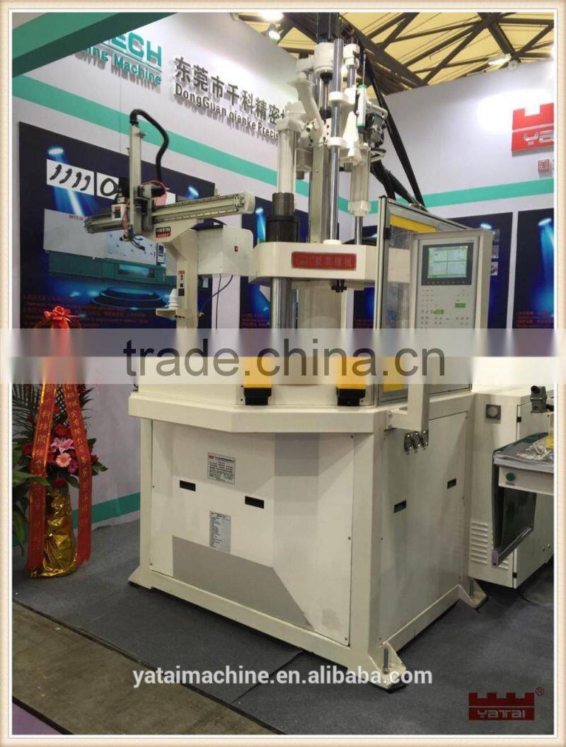 Vertical injection moulding machine-rotary table