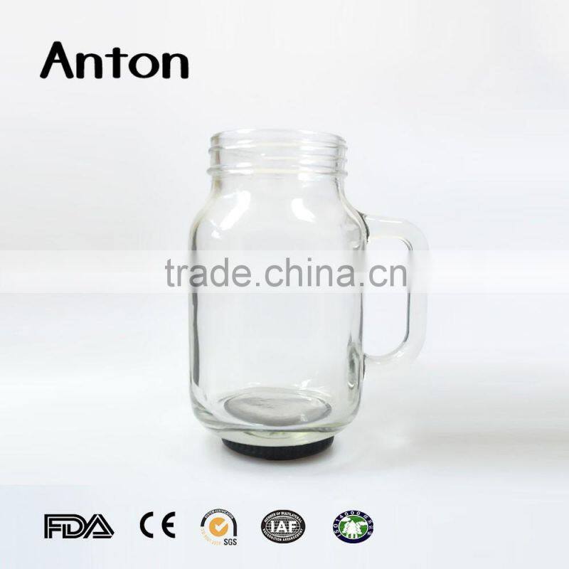 Glass juice drinking mason jar with handle and lid