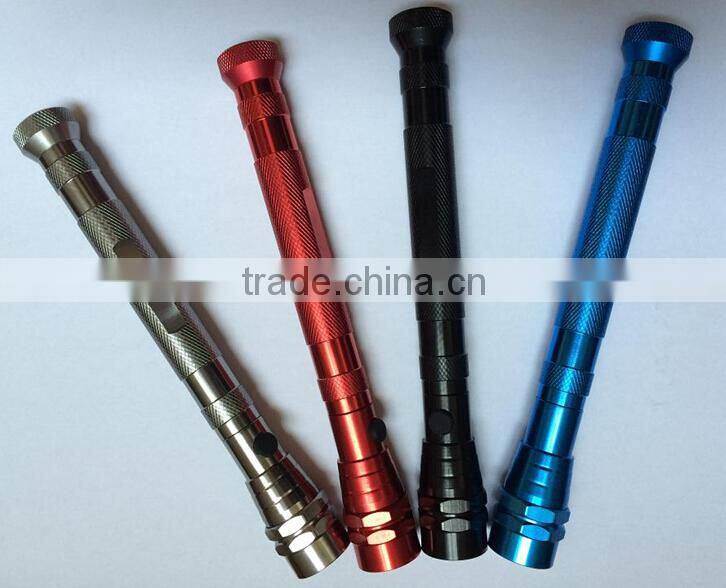 LED flashlight with telescopic magnetic pick-up tool